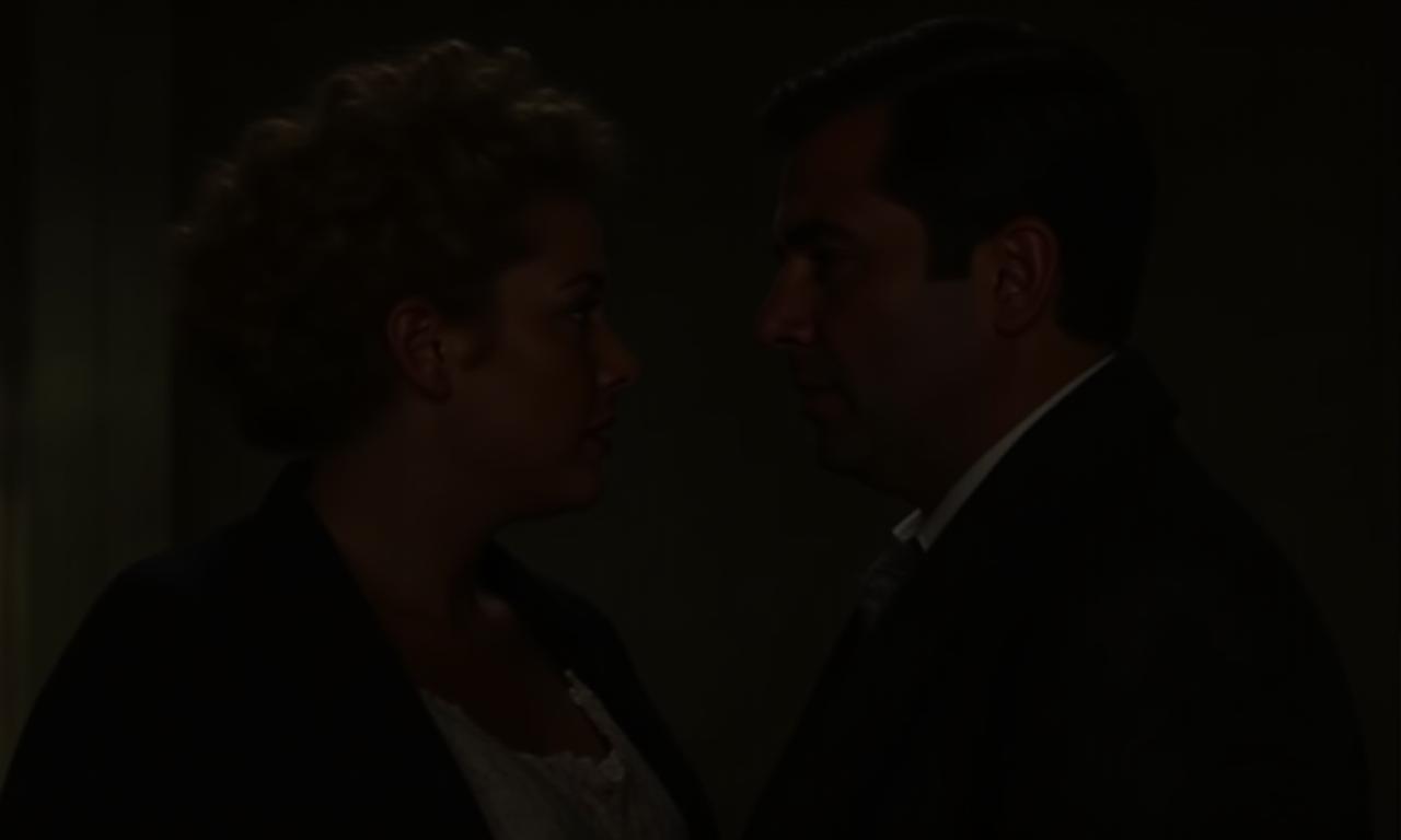 Image d'un film belge restauré, scène classique avec deux personnages.